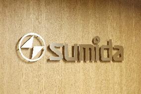 Sumida Corporation signboard and logo